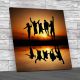 Jumping for Joy At Beach Square Canvas Print Large Picture Wall Art
